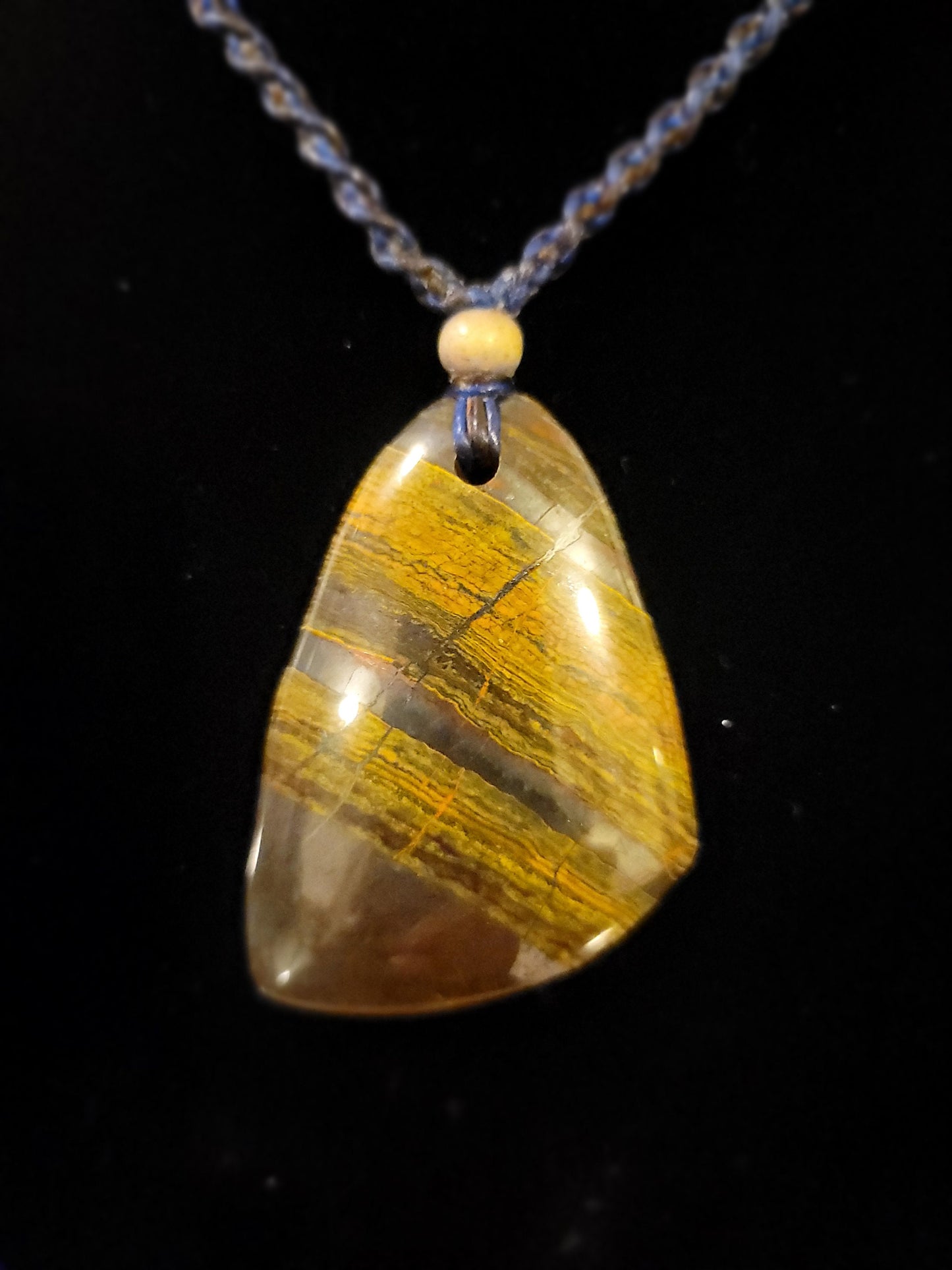 “Strength in Stillness” – Iron Tiger Eye Pendant Necklace, Blue Cord with Clear Quartz Beads, Adjustable