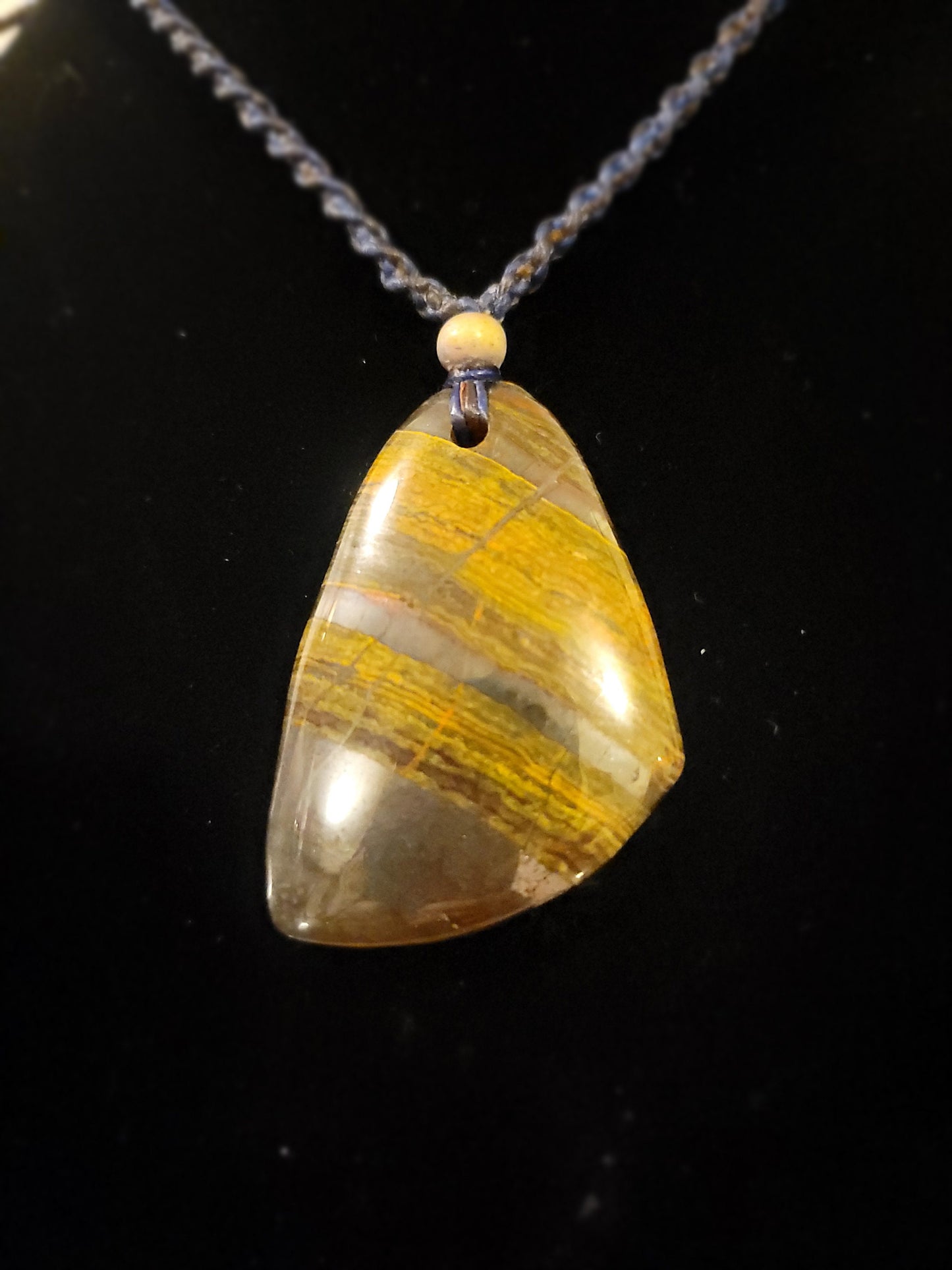 “Strength in Stillness” – Iron Tiger Eye Pendant Necklace, Blue Cord with Clear Quartz Beads, Adjustable